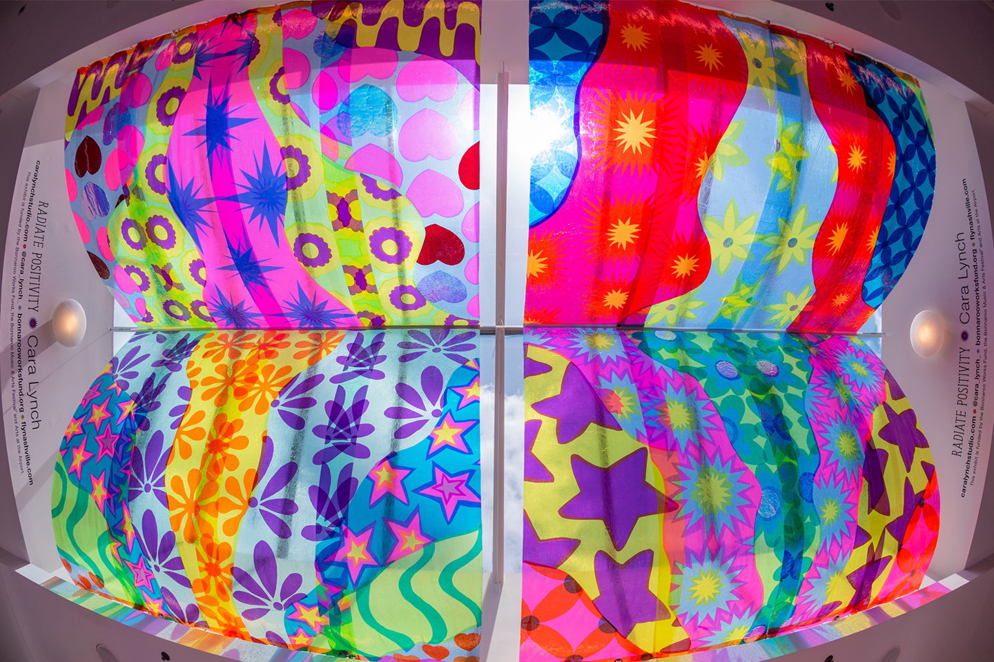 A look up at the multicolored artwork