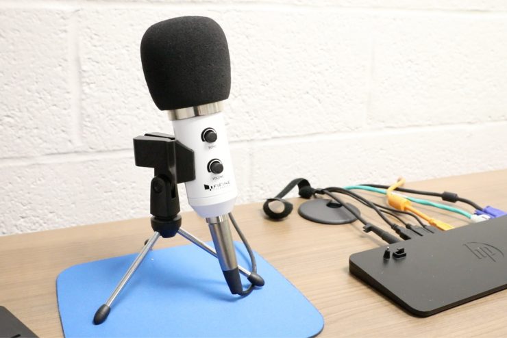 and a wireless microphone system—particularly beneficial for capturing the natural movements of young children during recordings.