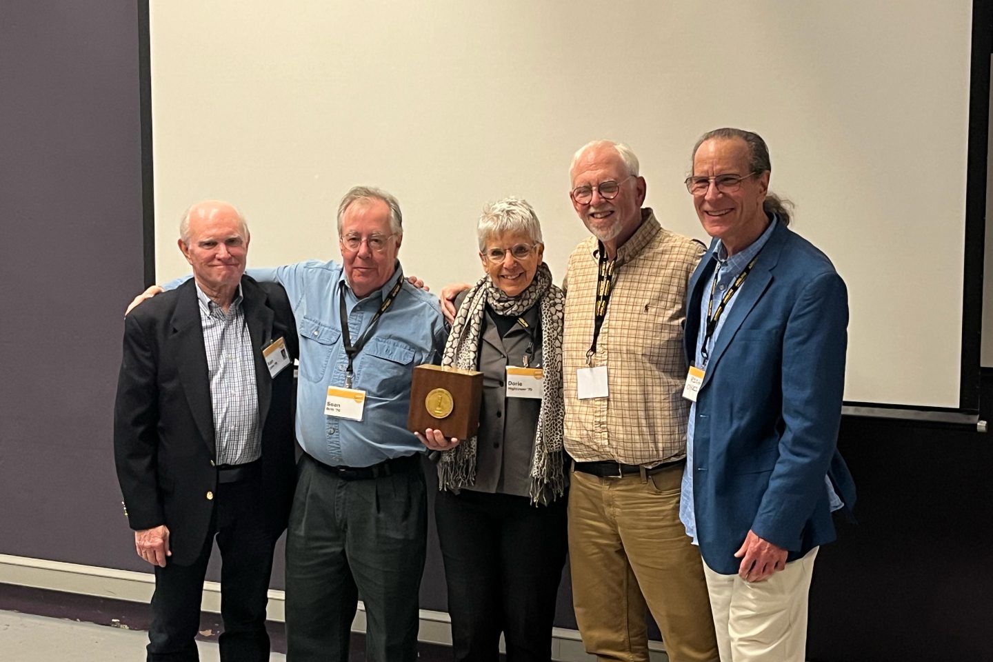 Alumni from What The Notes Say film all take a picture with the Student Academy Award