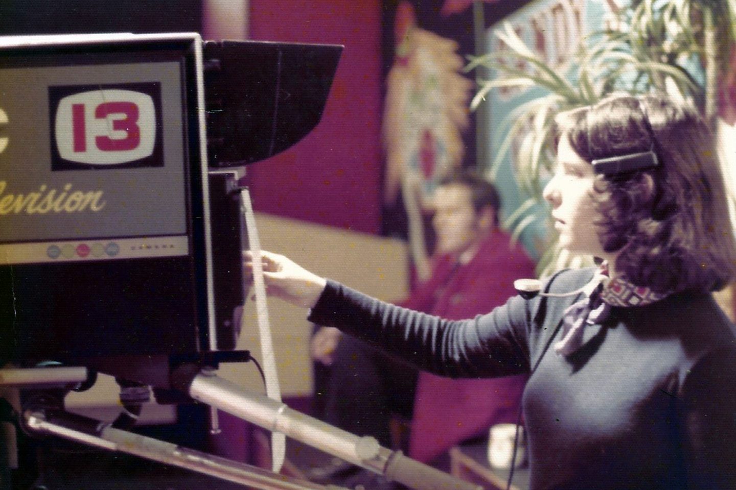 Dorie (née Caplan) Hightower operates a camera in 1975