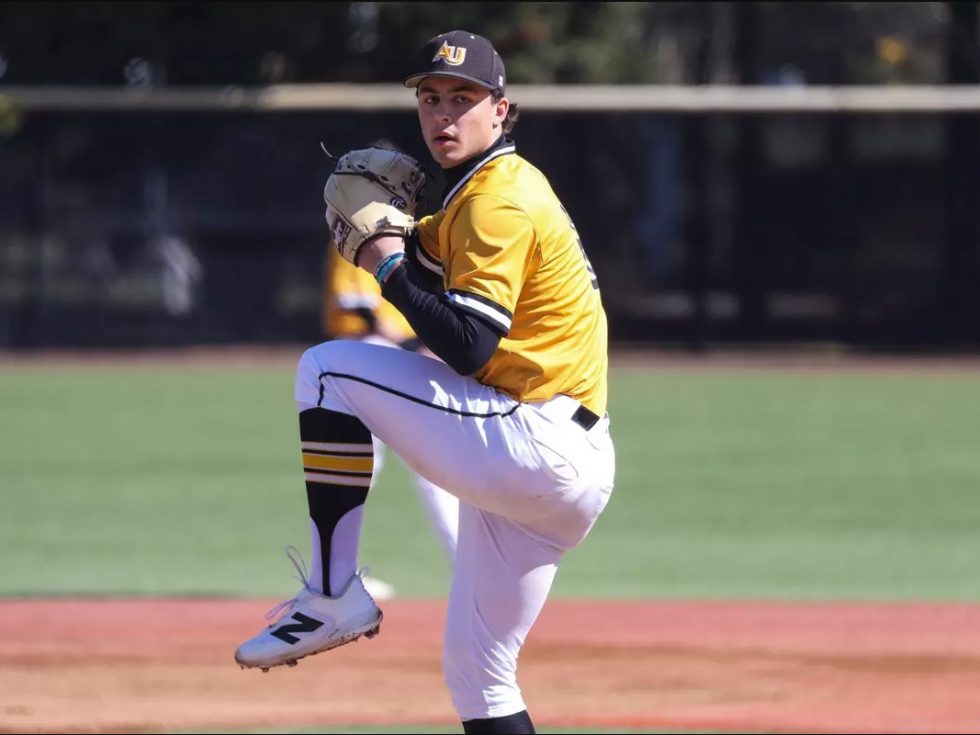 John Carver Signs With Houston Astros. Picture of him pitching for Adelphi University Panthers.