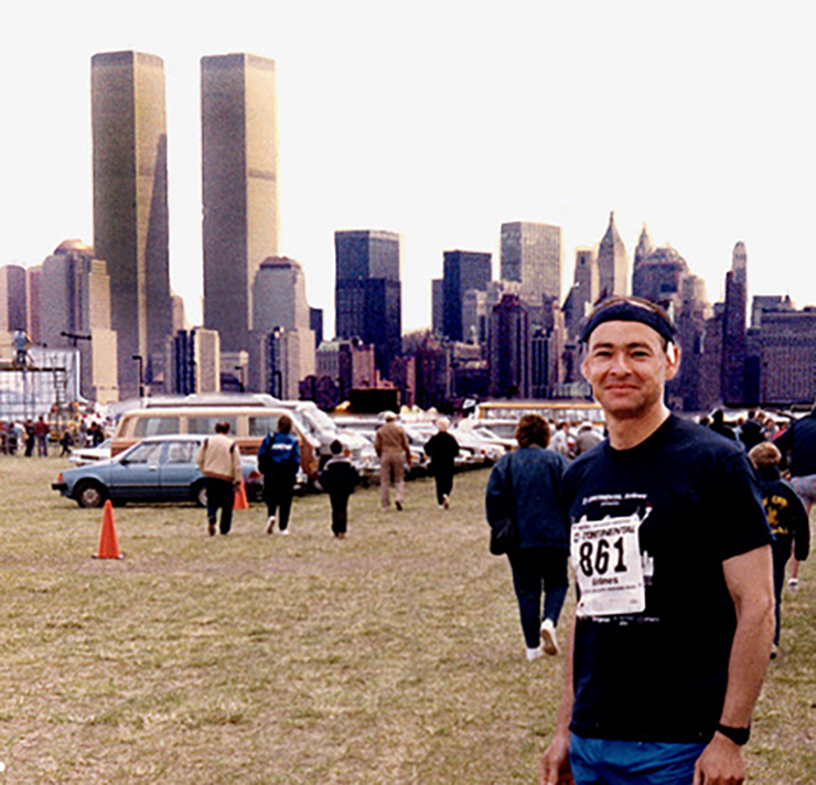 Elliot Gordon, MA ’68 pictured at the Waterfront marathon on April 23, 1988 with NYC Twin Towers in the background.
