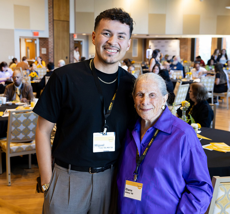 Miguel Velasquez and Diane Abbey in attendance at an Adelphi conference.