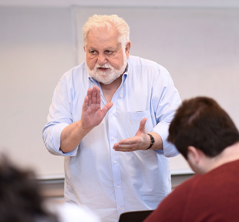 Professor Primeggia in the classroom.