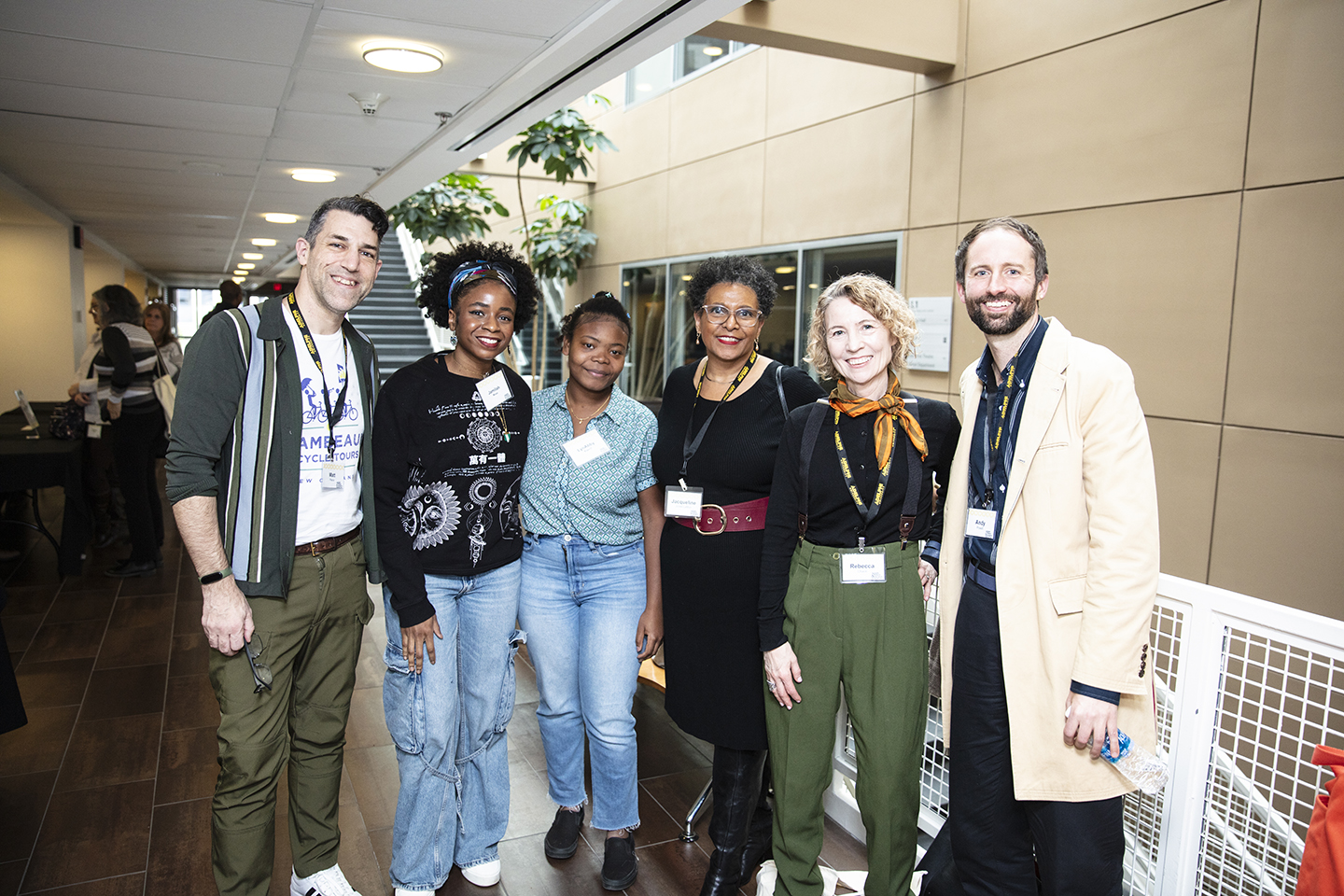 The panelists and attendees, standing outside the auditorium.